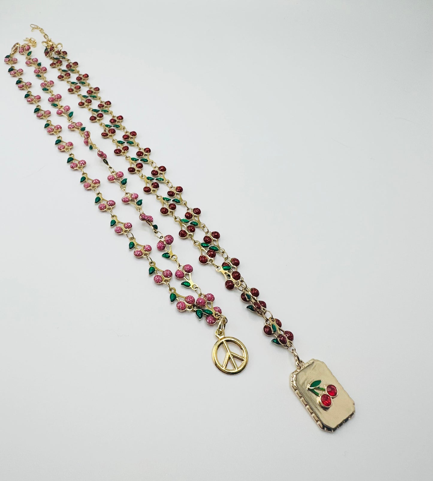 CHERRY PEACE NECKLACE