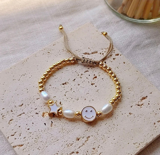 ADJUSTABLE HAPPY FACE PEARL BRACELET